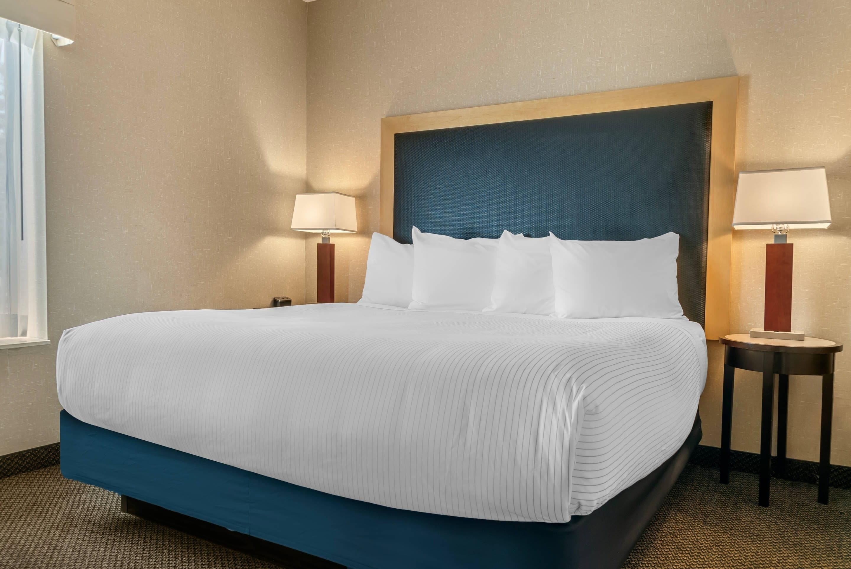 Premium bedding, desk, blackout drapes, iron/ironing board