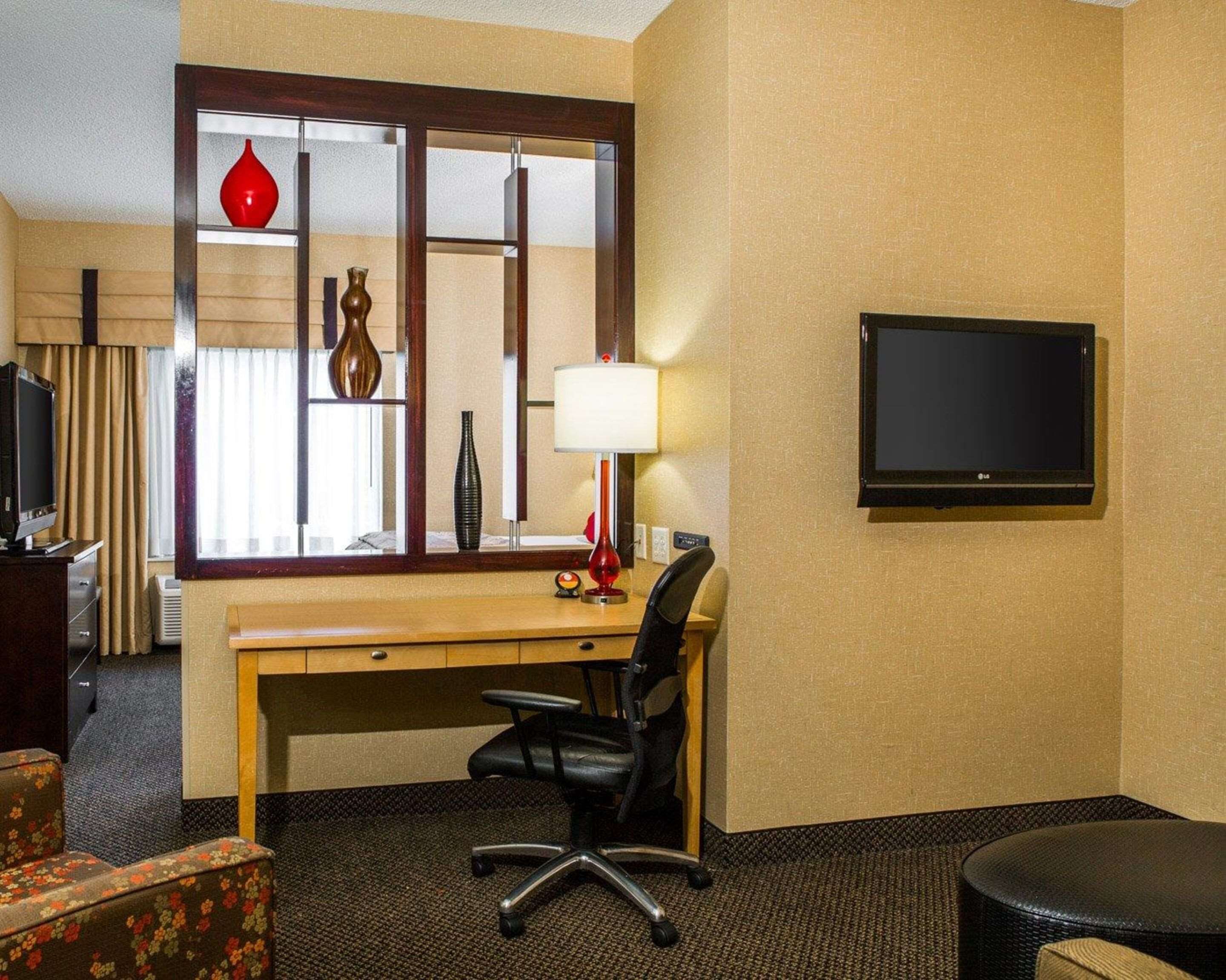 premium bedding, desk, blackout curtains, iron/ironing board