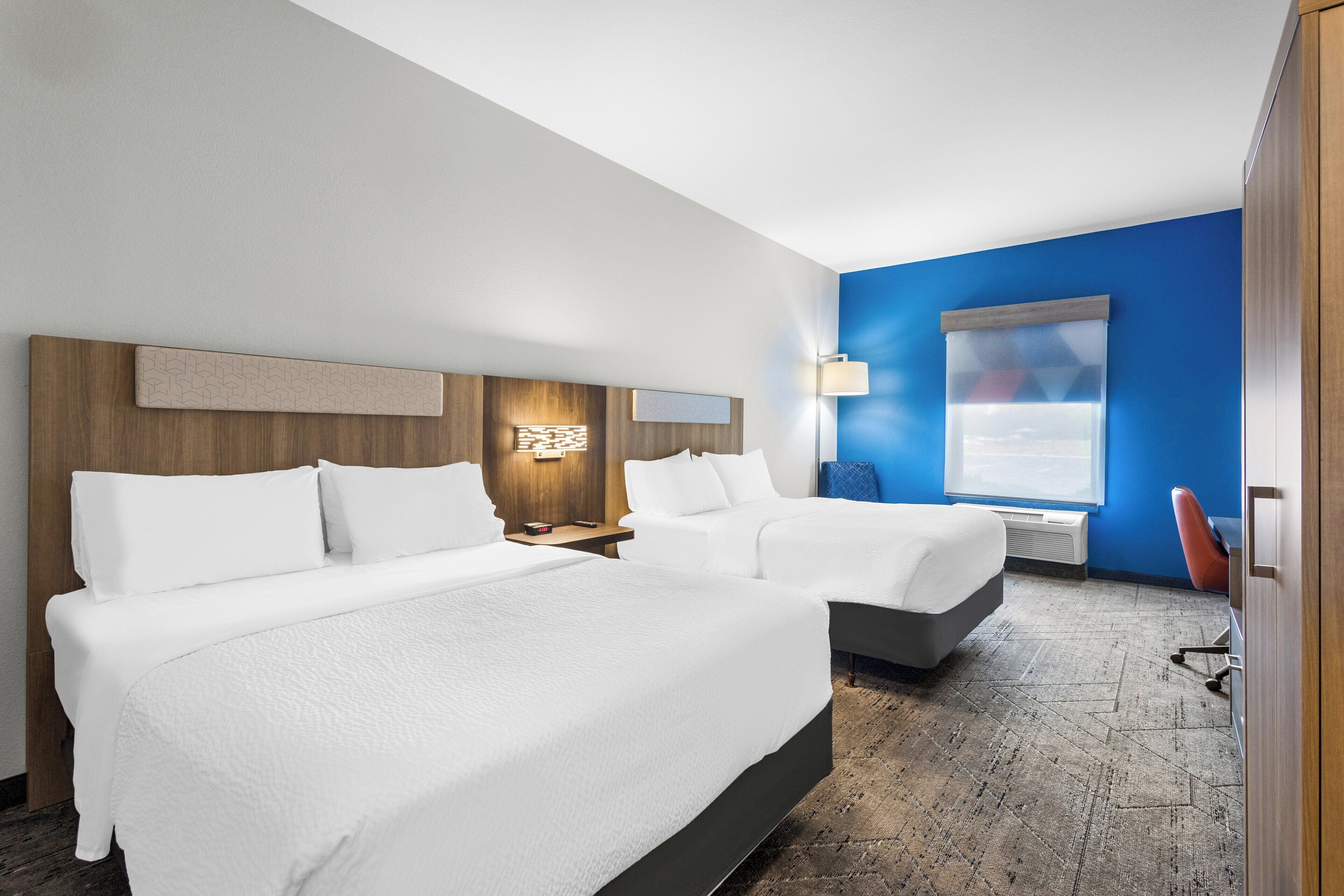 standard room, 2 queen beds | 1 bedroom, desk, iron/ironing board, free cots/infant beds