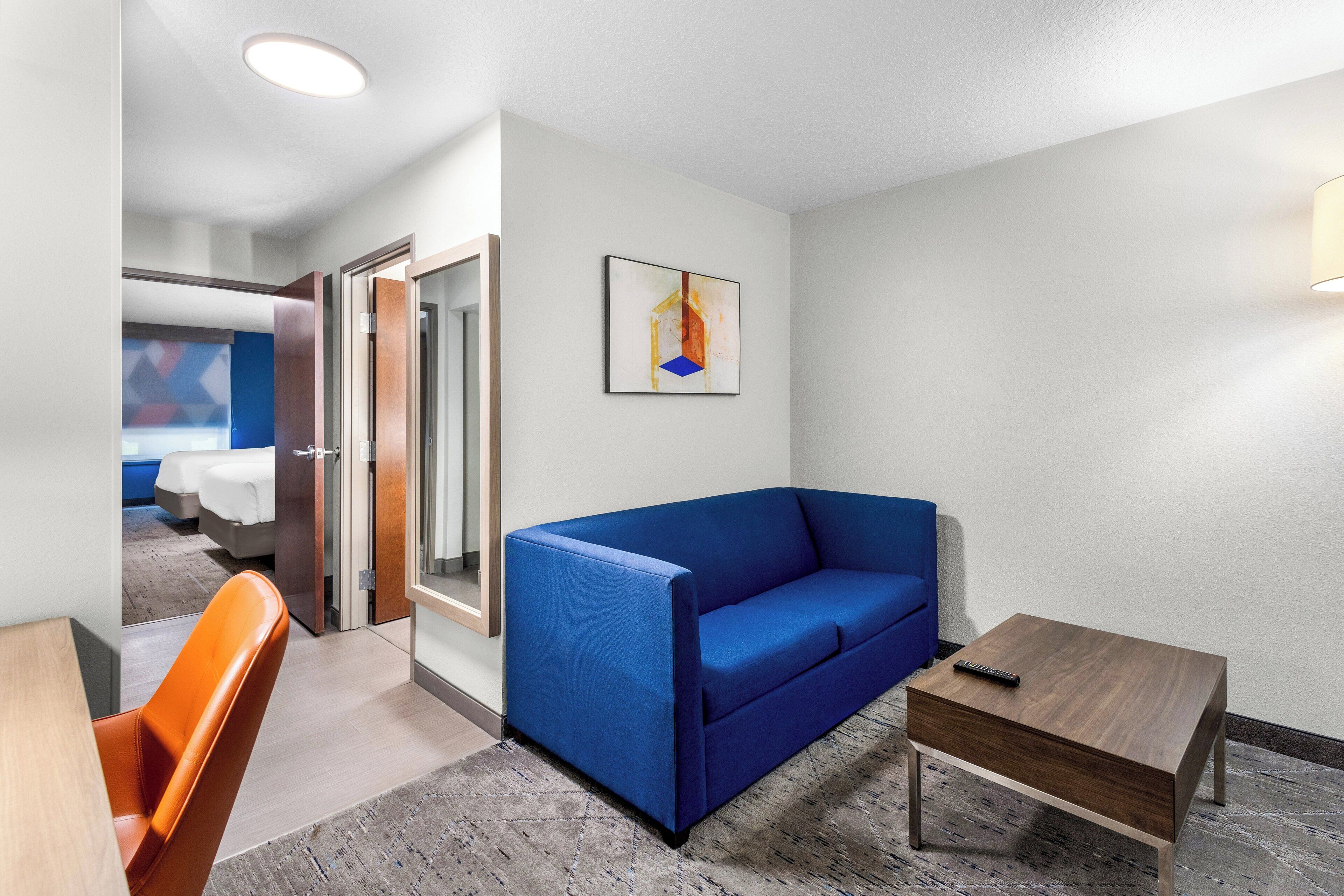 suite, 2 queen beds | 1 bedroom, desk, iron/ironing board, free cots/infant beds