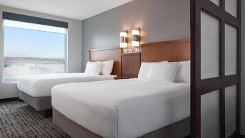 Hypo-allergenic bedding, down comforters, desk, laptop workspace