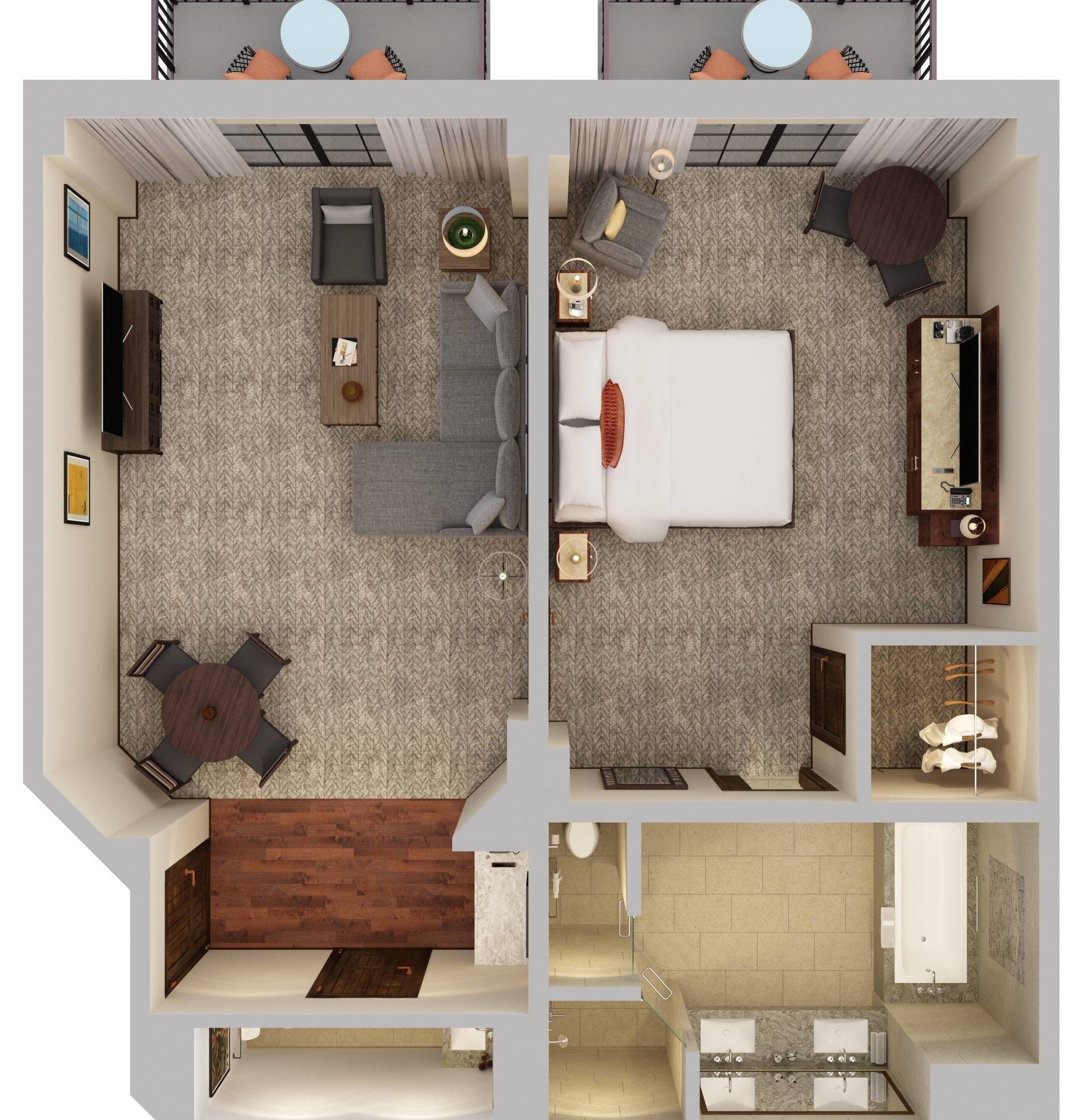 A hotel room with a bed, a desk, a chair, a round table, a bathroom with a bathtub, and a shower.