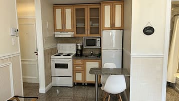Suite Deluxe, 1 cama King size y sofá cama | 1 habitación, sábanas de algodón egipcio y ropa de cama de alta calidad