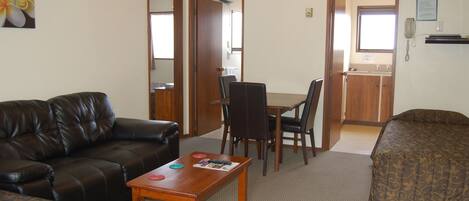 Apartment, 1 Bedroom | Living area | TV