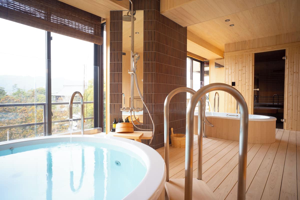 ocean view royal suite twin room kagamiike (with open air bath & sauna) 100m2 | bathroom | combined shower/bathtub, deep-soaking bathtub, free toiletries