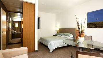 Suite | Frette Italian sheets, premium bedding, minibar, in-room safe