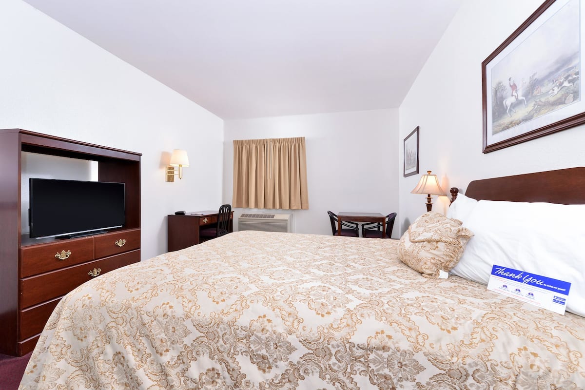Desk, blackout curtains, iron/ironing board, rollaway beds