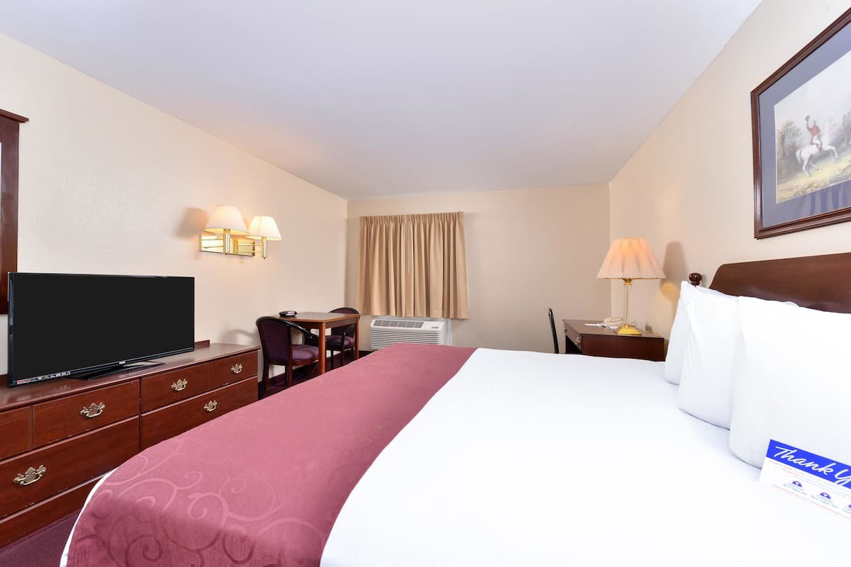 Desk, blackout curtains, iron/ironing board, rollaway beds