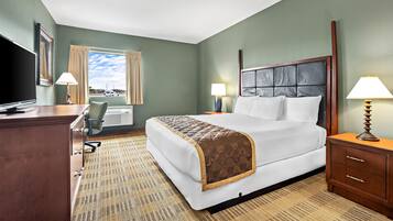 Room, 1 King Bed, Non Smoking | Desk, blackout drapes, iron/ironing board, rollaway beds