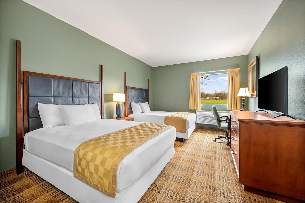 Desk, blackout curtains, iron/ironing board, rollaway beds