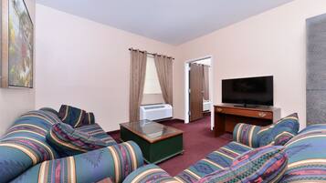 Suite, 1 King Bed, Non Smoking, Kitchenette | Desk, blackout drapes, iron/ironing board, rollaway beds