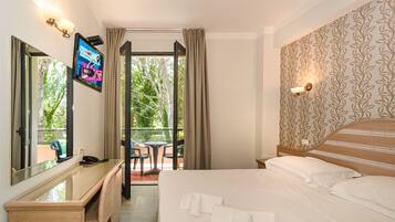 Standard Double or Twin Room | Minibar, in-room safe, desk, iron/ironing board