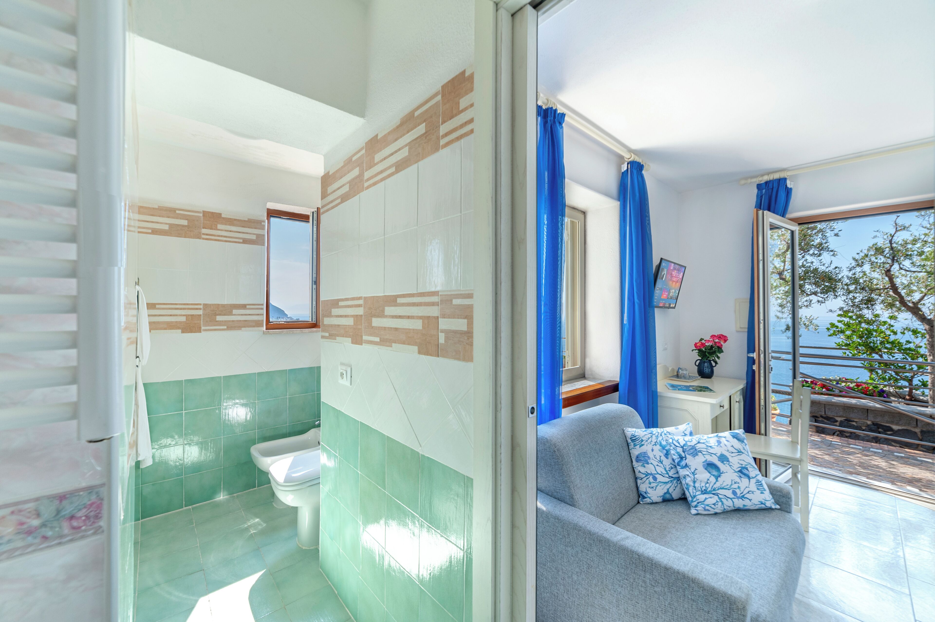 junior suite | bathroom | shower, hair dryer, bidet, towels