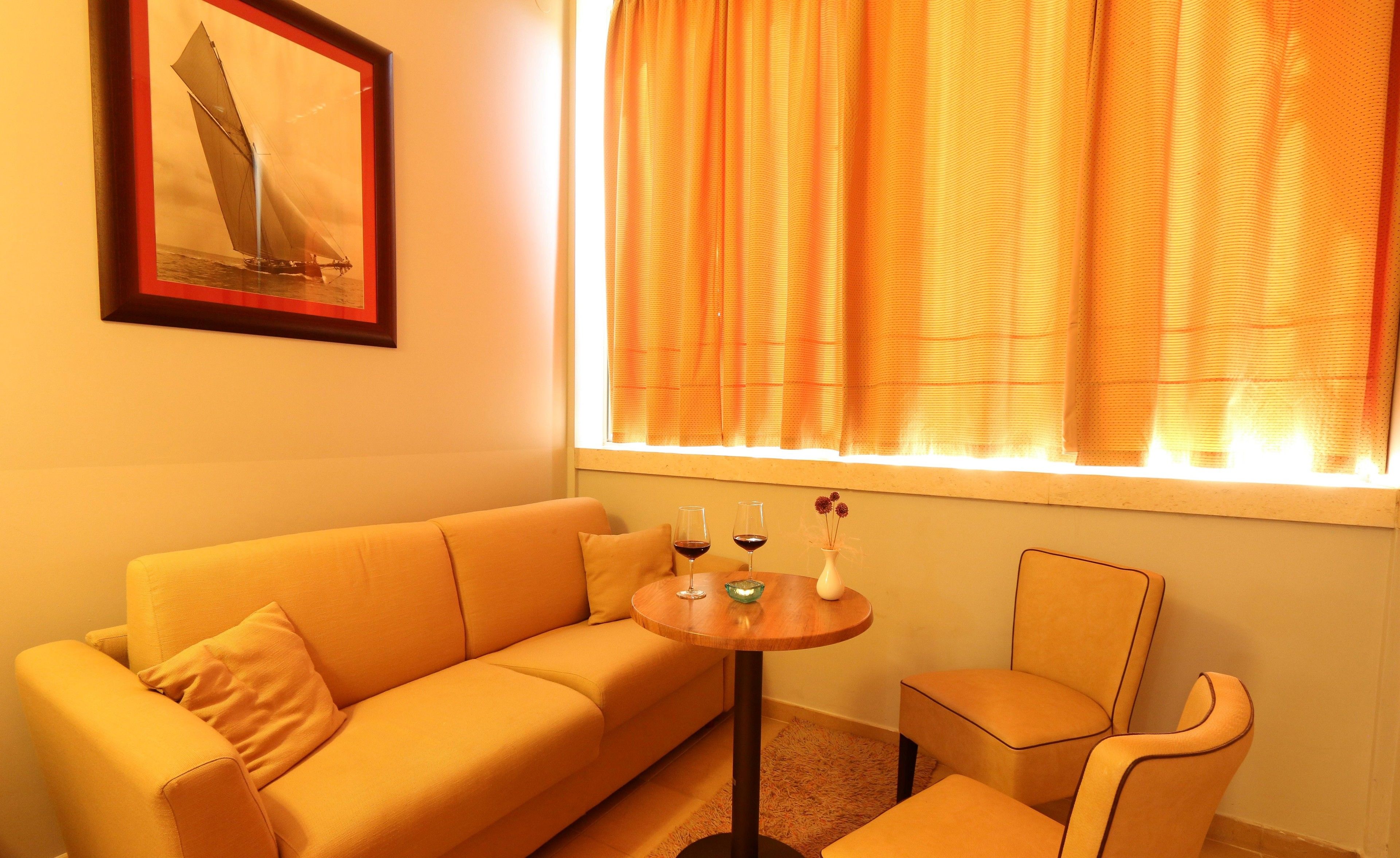 standard double room | living area | flat-screen tv