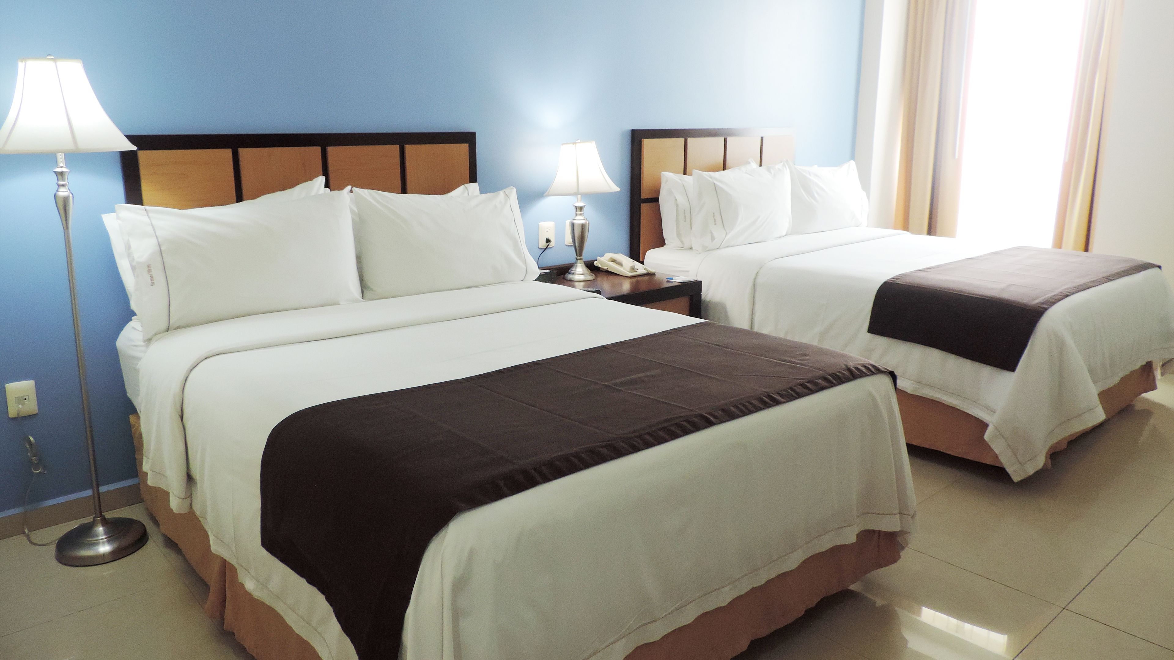 standard room, 2 double beds | in-room safe, desk, iron/ironing board, free wifi