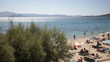 On the beach, beach towels