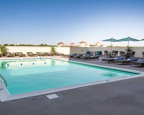 Seasonal outdoor pool, pool umbrellas, sun loungers