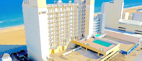 Seasonal outdoor pool, pool umbrellas, pool loungers