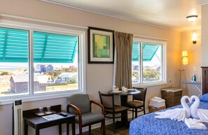 Premium Room, 2 Double Beds, Kitchenette | 1 bedroom, desk, laptop workspace, blackout drapes