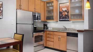 Premium bedding, desk, laptop workspace, iron/ironing board