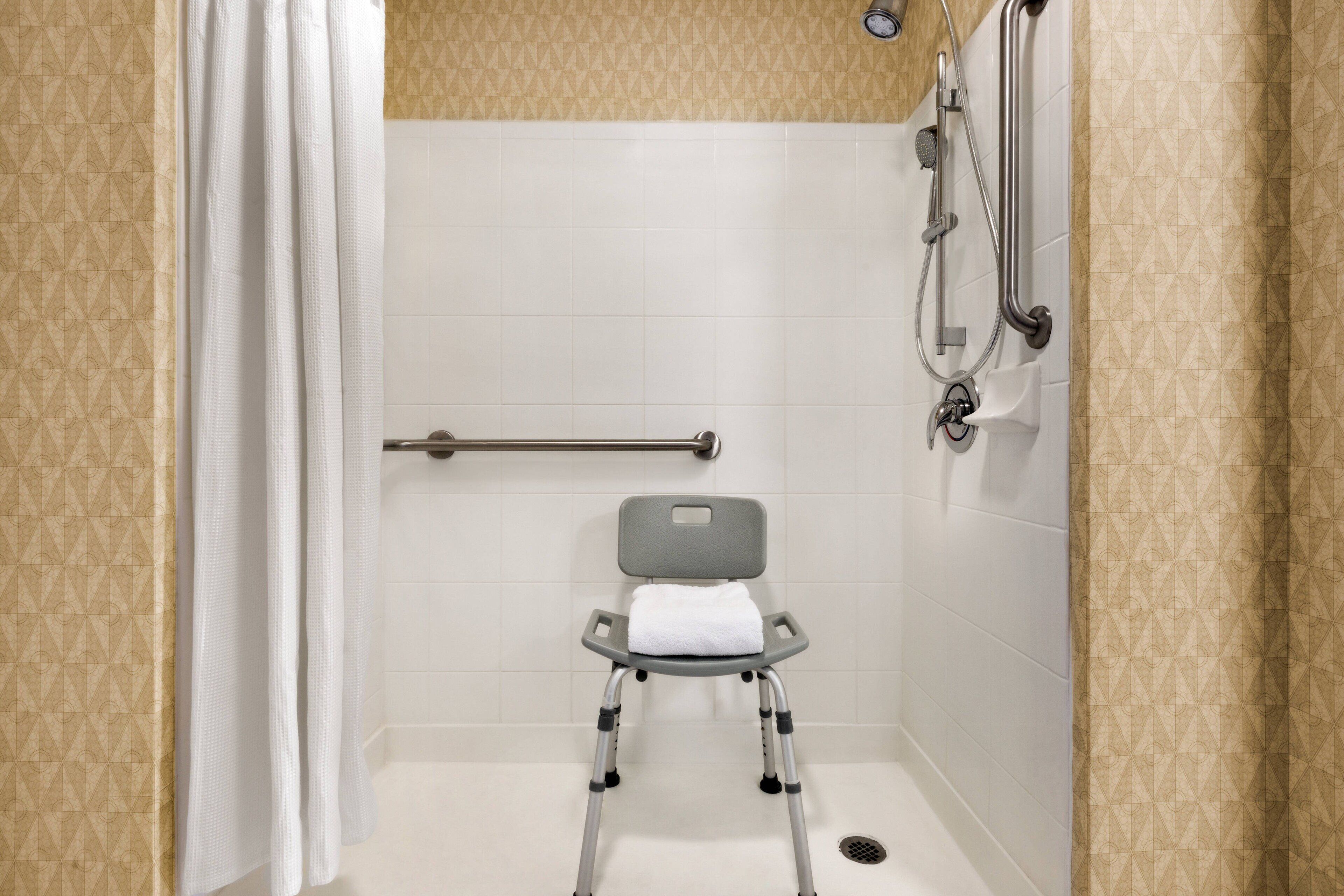 combined shower/bathtub, free toiletries, hair dryer, towels