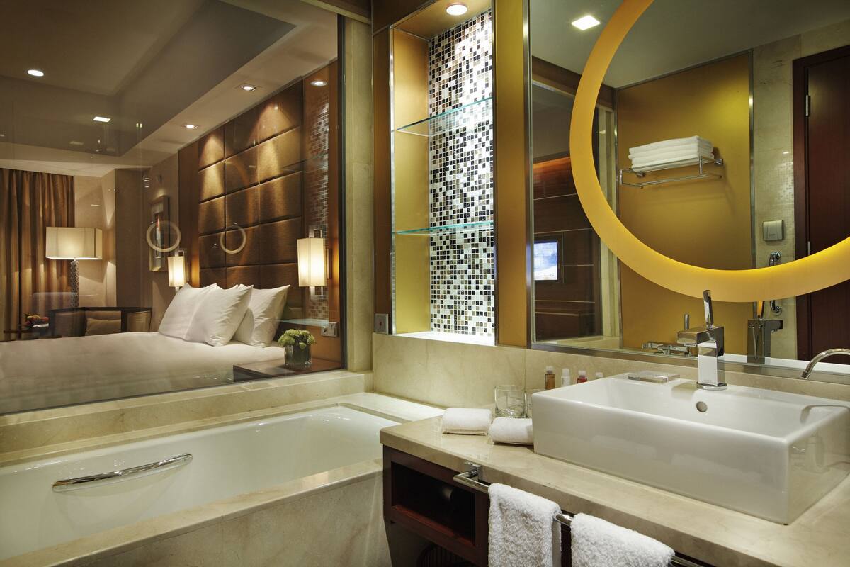 Separate tub and shower, rainfall showerhead, free toiletries