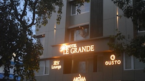 A hotel with a sign reading "HOTEL LE GRANDE" and "GUSTO" on the facade. - Hotel Le Grande - Mumbai International Airport (Mumbai)