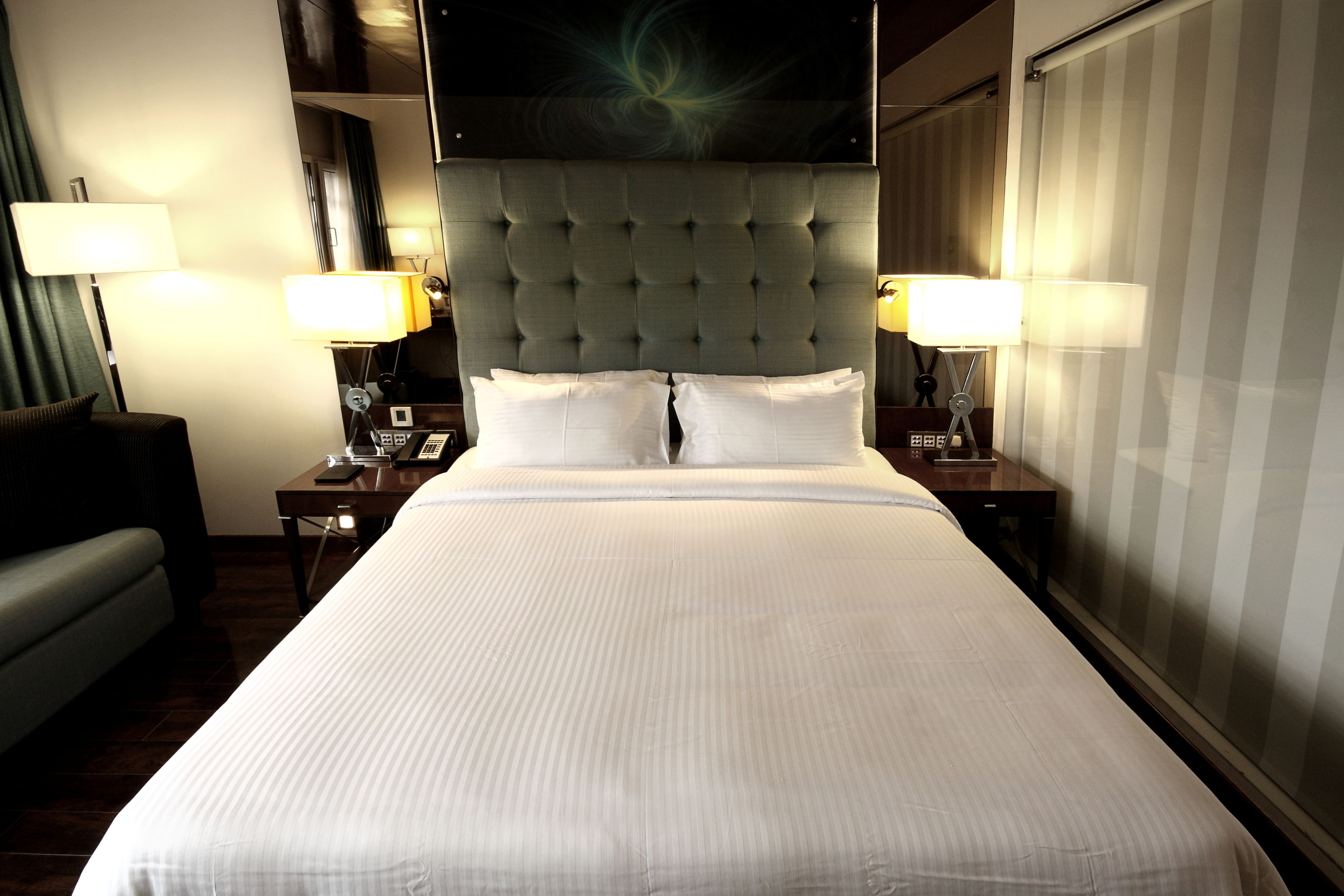 deluxe room | premium bedding, minibar, in-room safe, desk