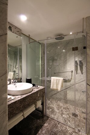 Shower, rainfall showerhead, designer toiletries, hair dryer - The Elanza Hotel (Bengaluru)