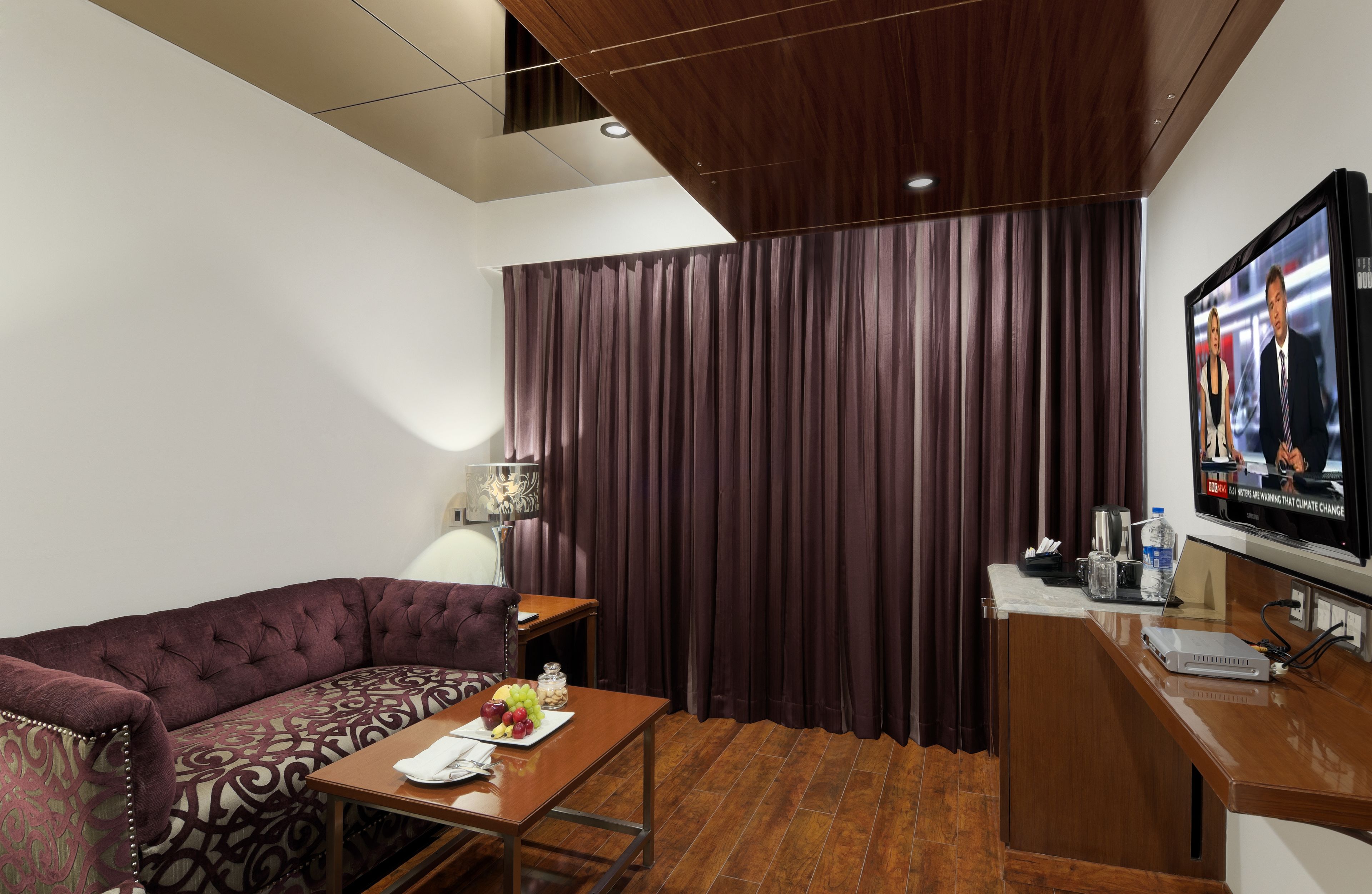 premium suite | living area | 42-inch lcd tv with digital channels, tv, video game console