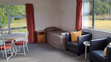 Estúdio | Área de estar | TV 52 polegadas com canais digitais