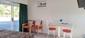 Studio | Living area | 52-inch TV with digital channels