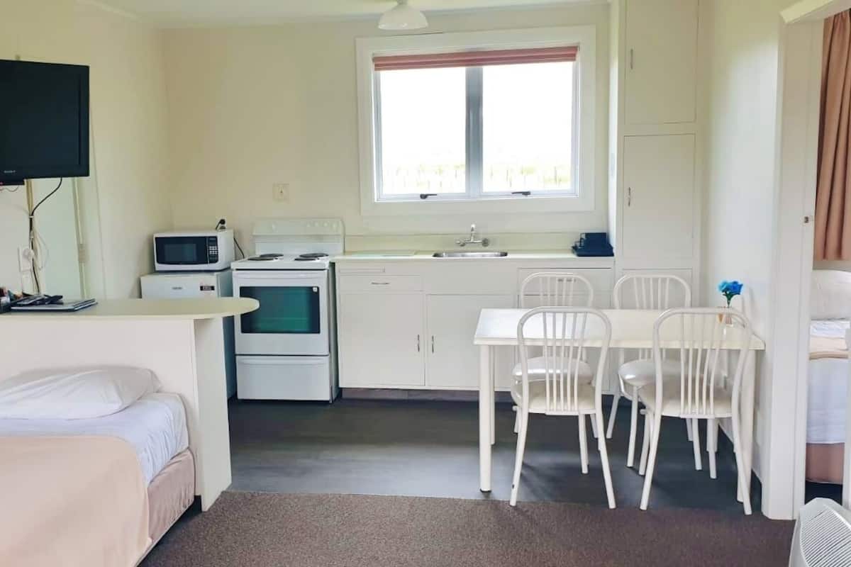 Departamento | Cocina privada | Refrigerador, microondas, tetera eléctrica y tostadora