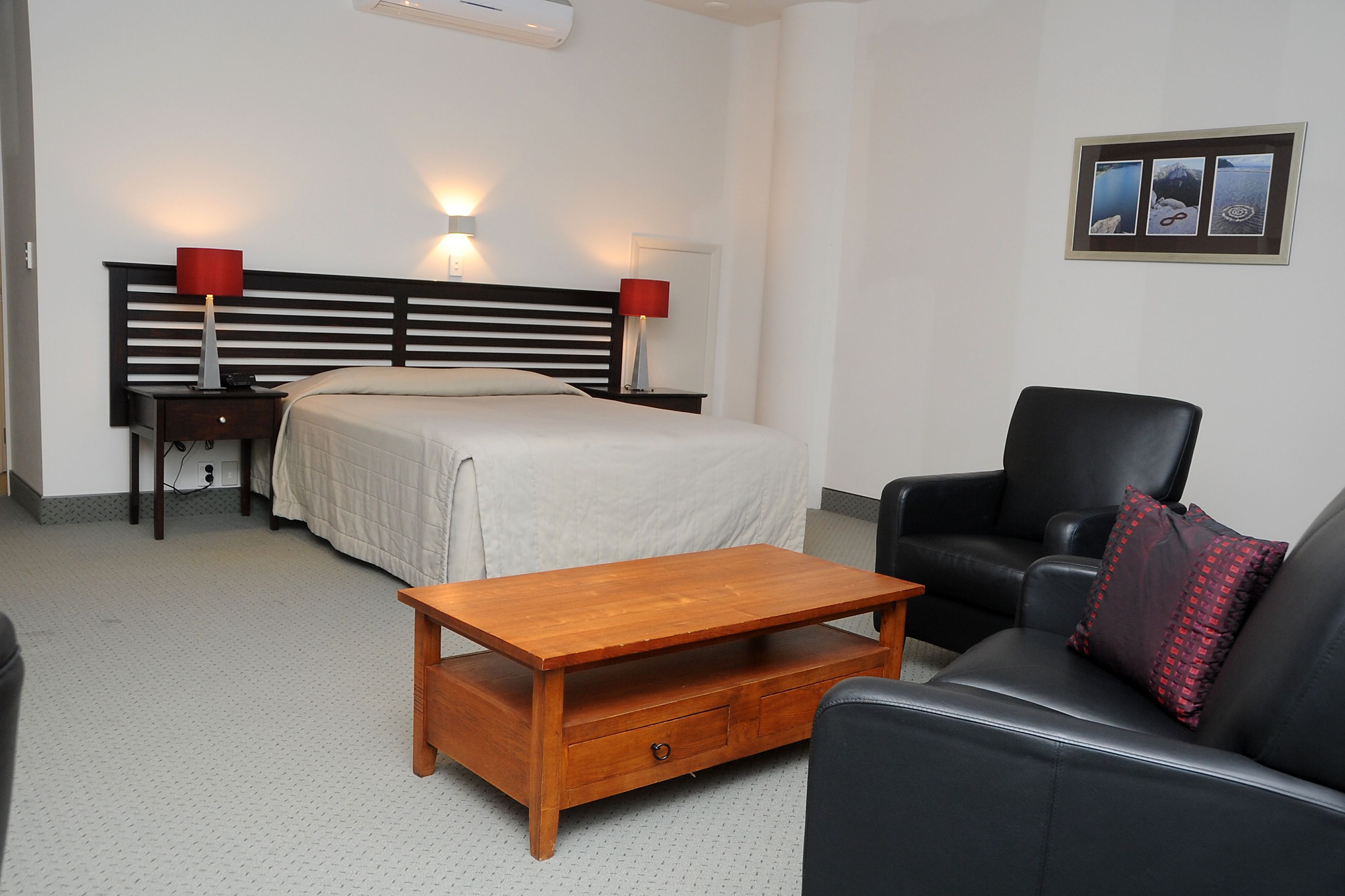 premium bedding, pillow-top beds, desk, blackout curtains