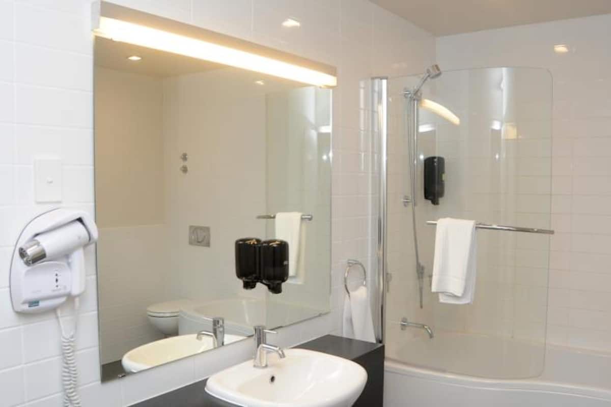 premium bedding, pillow-top beds, desk, blackout curtains