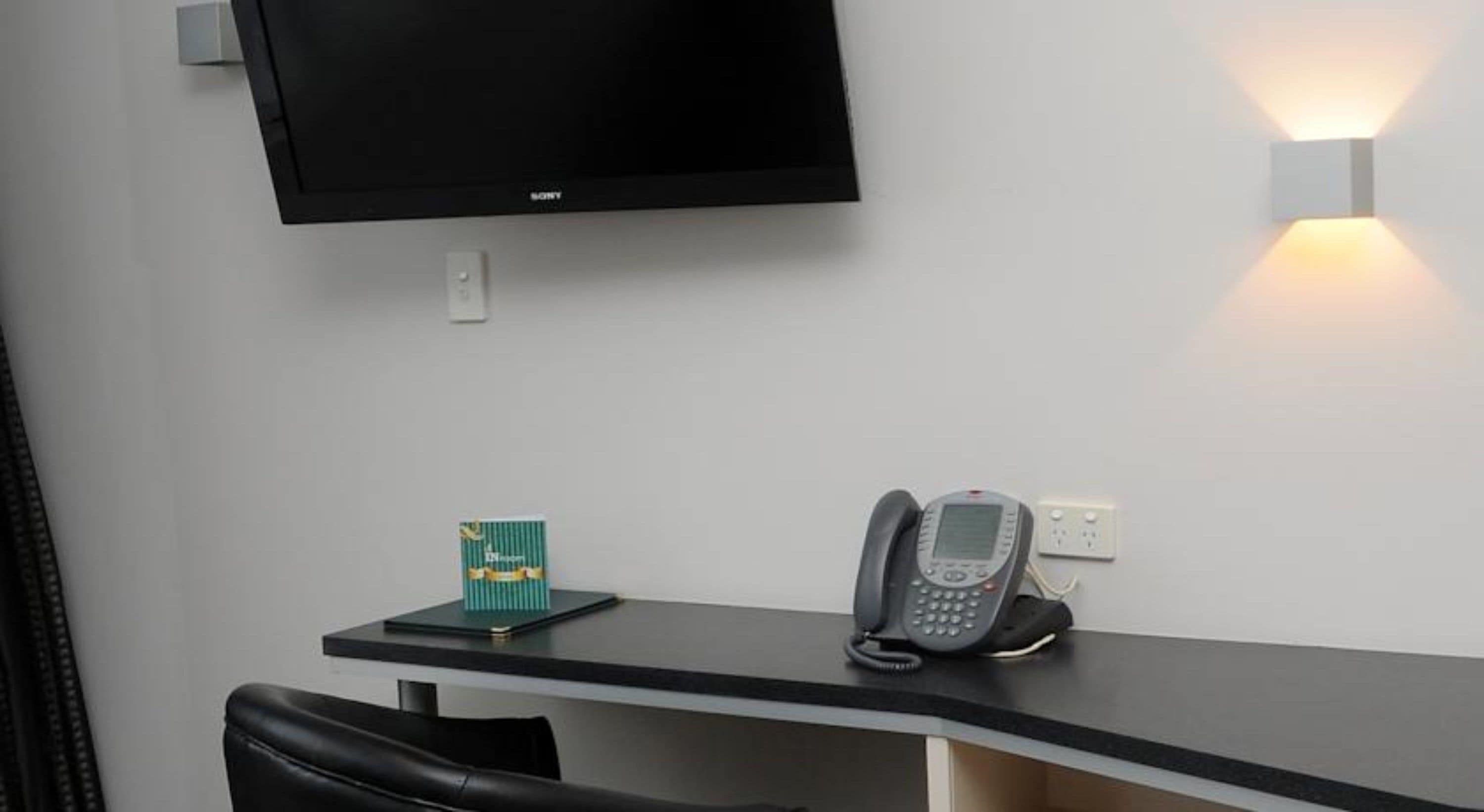 premium bedding, pillow-top beds, desk, blackout curtains