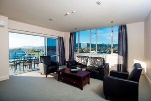 Apartment, 2 Bedrooms | Living area | 40-inch flat-screen TV with digital channels