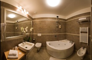 Shower, eco-friendly toiletries, hair dryer, bidet