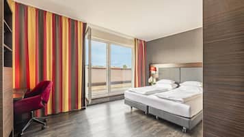 In-room safe, laptop workspace, blackout drapes, soundproofing