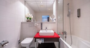 Bathtub, deep soaking tub, hair dryer, towels