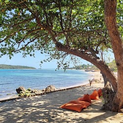 On the beach, sun-loungers, beach umbrellas, beach towels