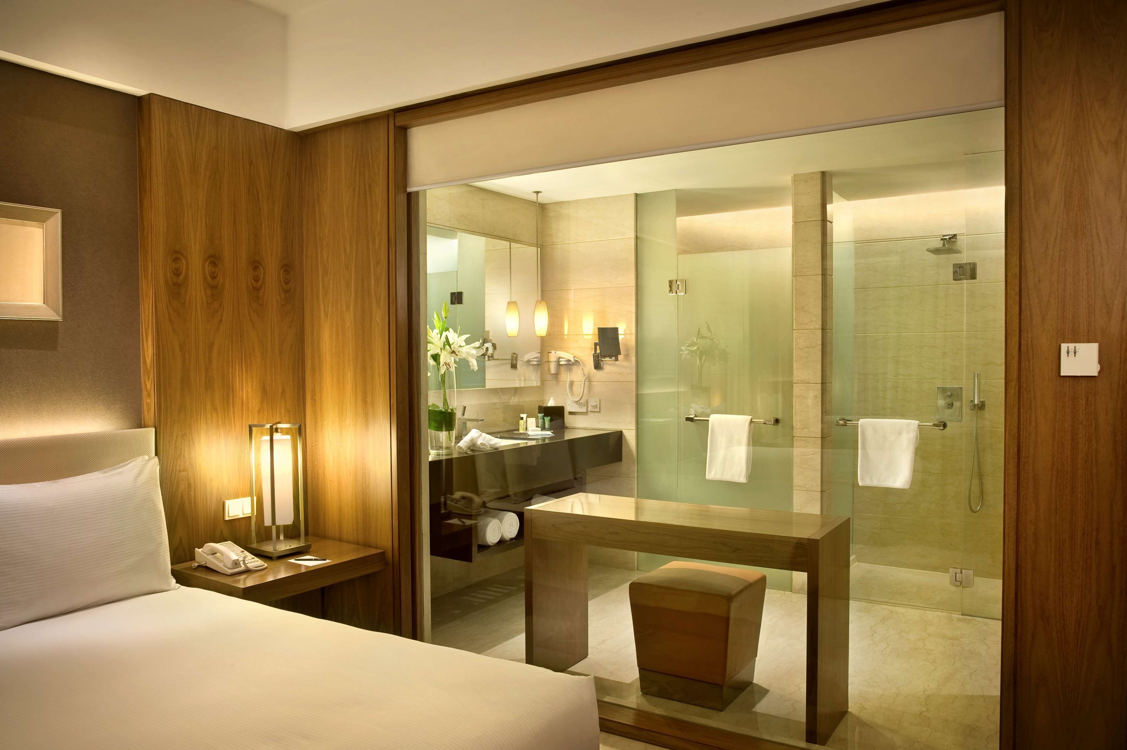 combined shower/bathtub, rainfall showerhead, designer toiletries