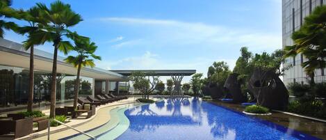 Outdoor pool, open 6 AM to 10:00 PM, free pool cabanas