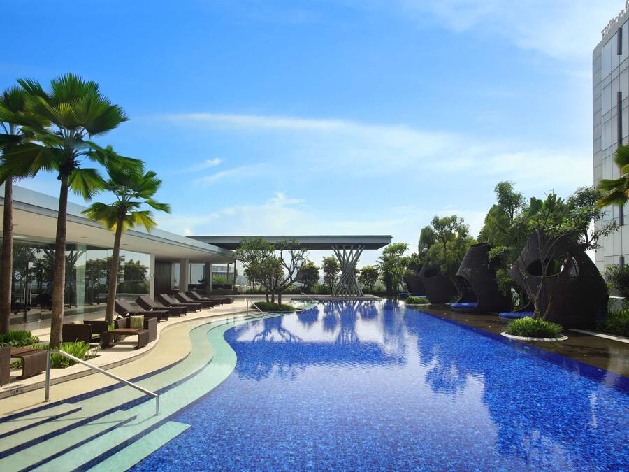 Outdoor pool, open 6 AM to 10:00 PM, free pool cabanas