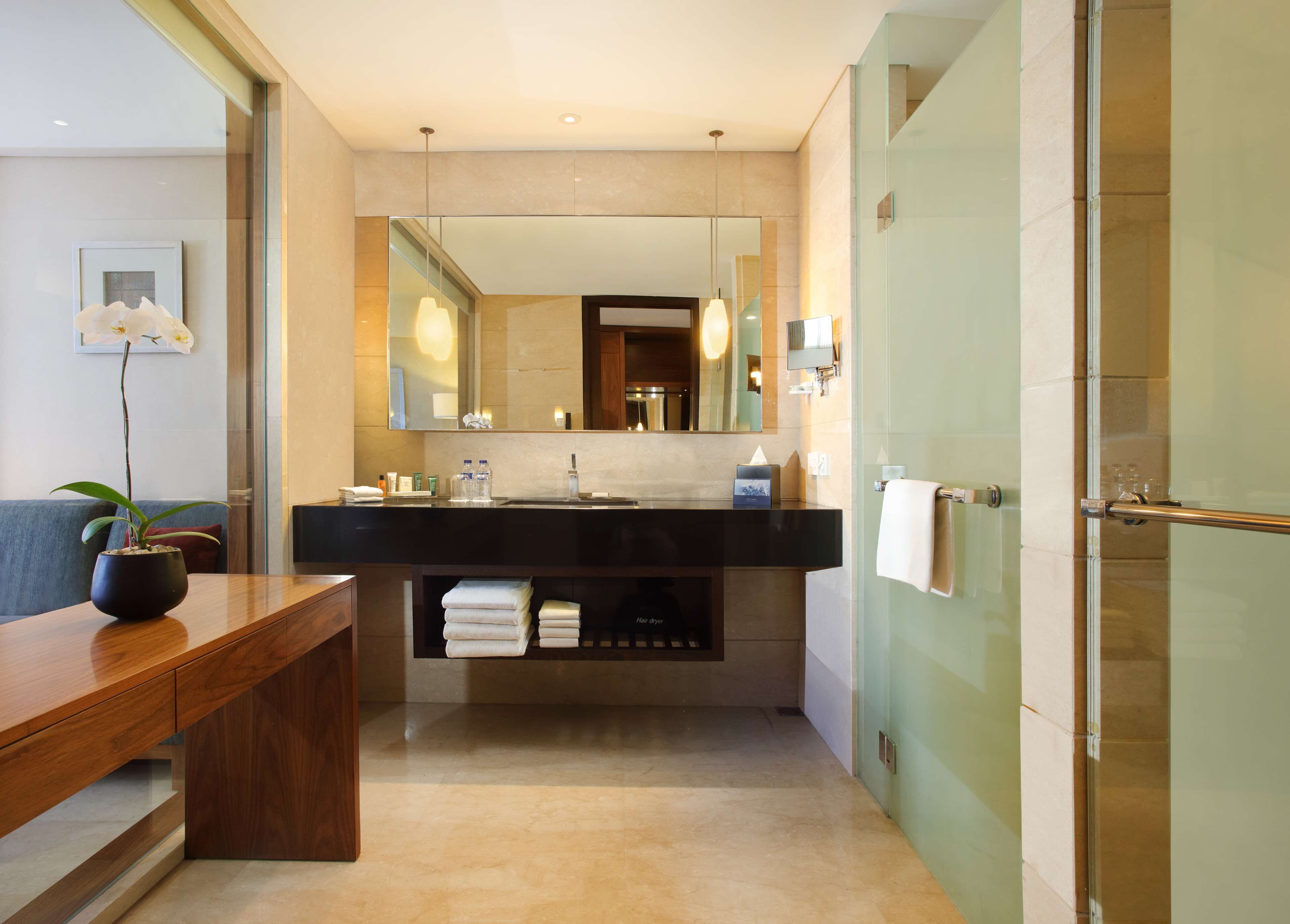 combined shower/bathtub, rainfall showerhead, designer toiletries