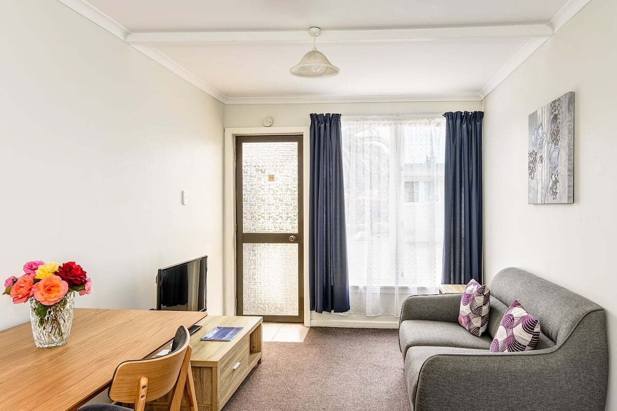 Apartment, 1 Bedroom | Living area | Flat-screen TV