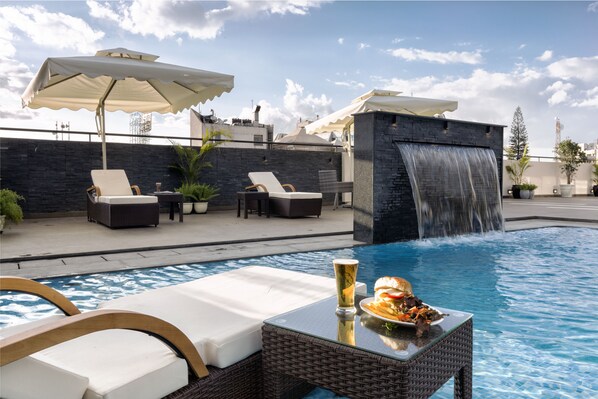 Outdoor pool - The Grand Magrath Hotel (Bengaluru)