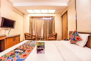 Deluxe kamer | Een minibar, een bureau, extra bedden, gratis wifi
