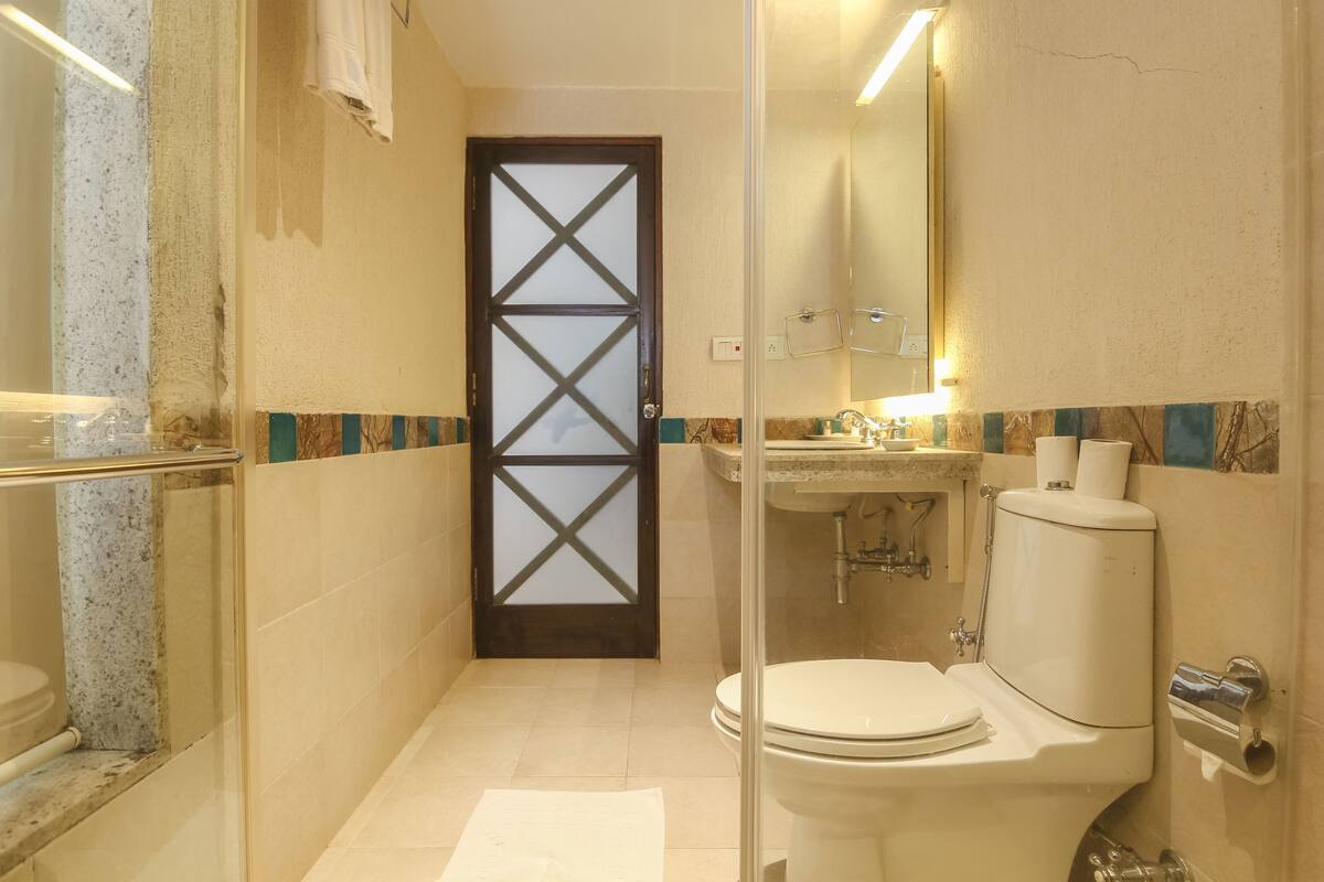 luxury room | bathroom | shower, hair dryer, towels