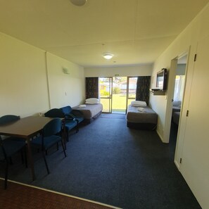 Family Room - Prepaid | Living area | Flat-screen TV, DVD player